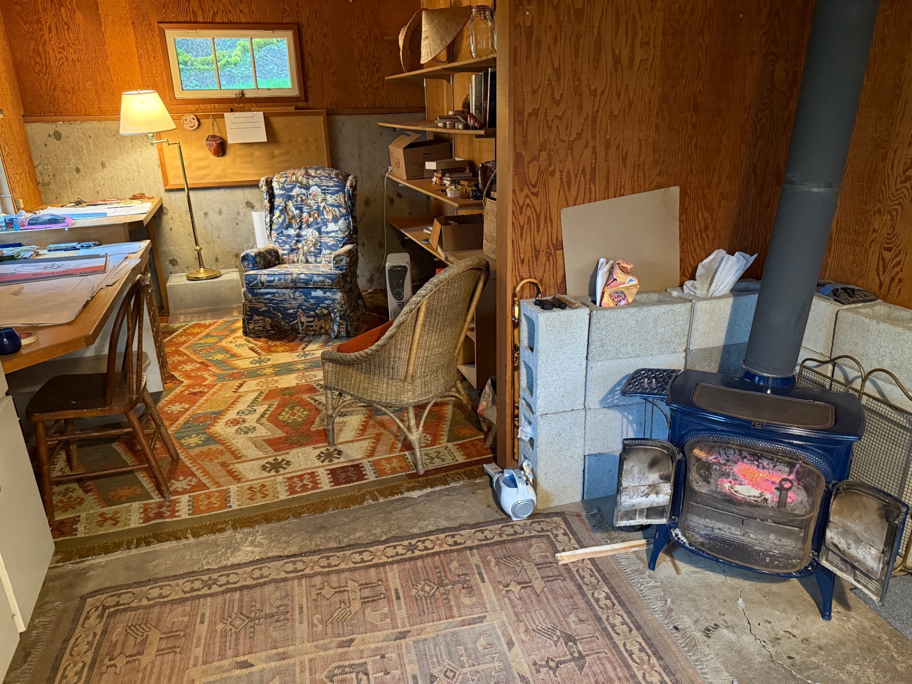 Cozy indoor therapy space with wood stove